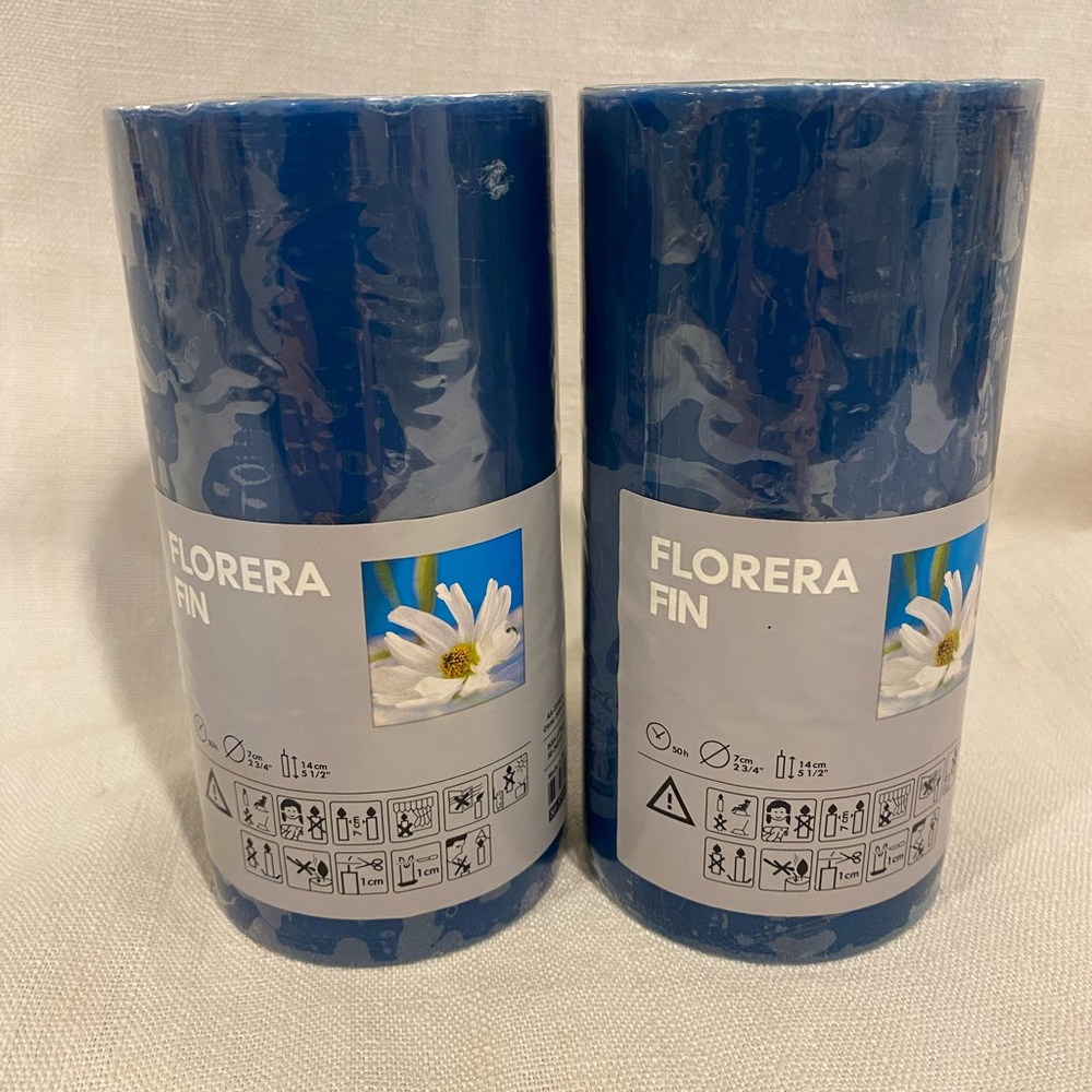 Set of two IKEA scented blue pillar candles 5 1/2 inches - new in pkg 50 hr burn
